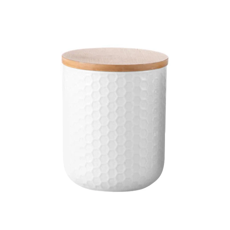 Białe ceramiczne kanistry